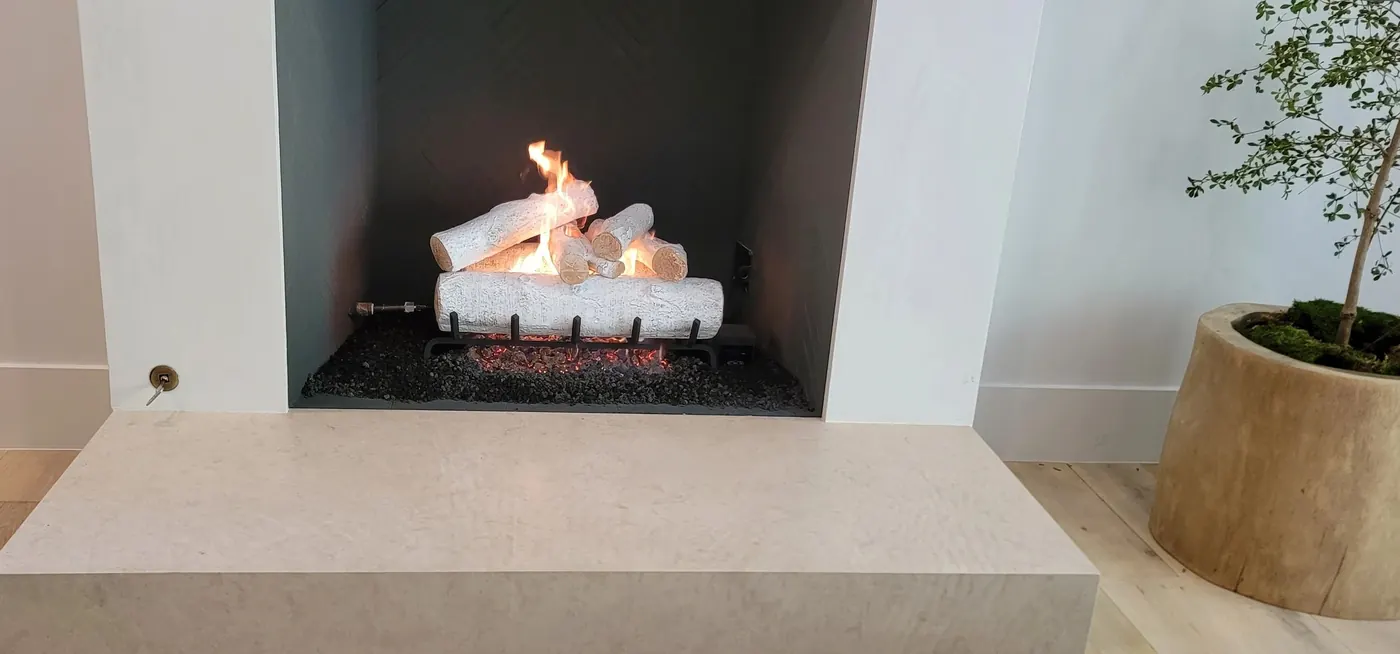 Modern fireplace with log set by 1st Class